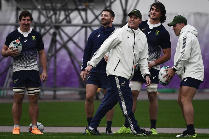 South Africa's head coach Rassie Erasmus (C) takes part in a training session at Arcs Urayasu Park in Urayasu on October 29, 2019, ahead of their Japan 2019 Rugby World Cup final against England. / AFP / Anne-Christine POUJOULAT
