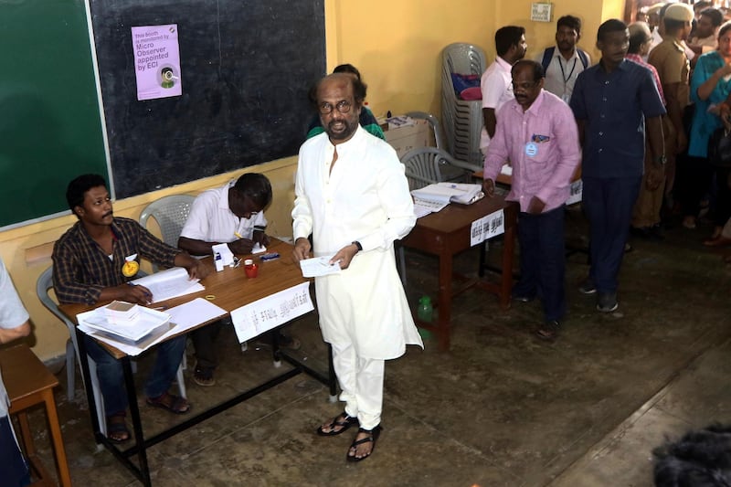 Indian superstar Rajnikanth arrives to cast his vote during the second phase of India's general elections in Chennai, India, Thursday, April 18, 2019. The Indian election is taking place in seven phases over six weeks in the country of 1.3 billion people. Some 900 million people are registered to vote for candidates to fill 543 seats in India's lower house of Parliament. (AP Photo/R. Parthibhan)