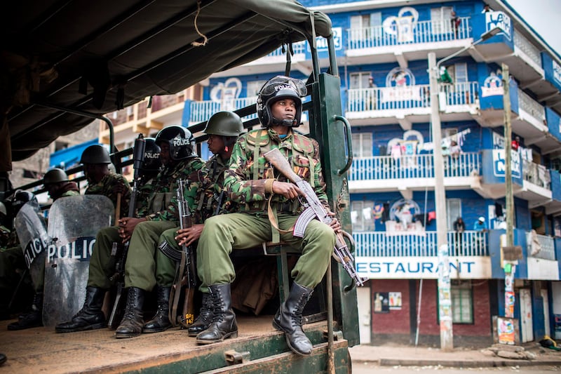 Kenyan police arrive to break up a protest of supporters of the Kenyan opposition presidential candidate in the Mathare slums of Nairobi. Luis Tato / AFP