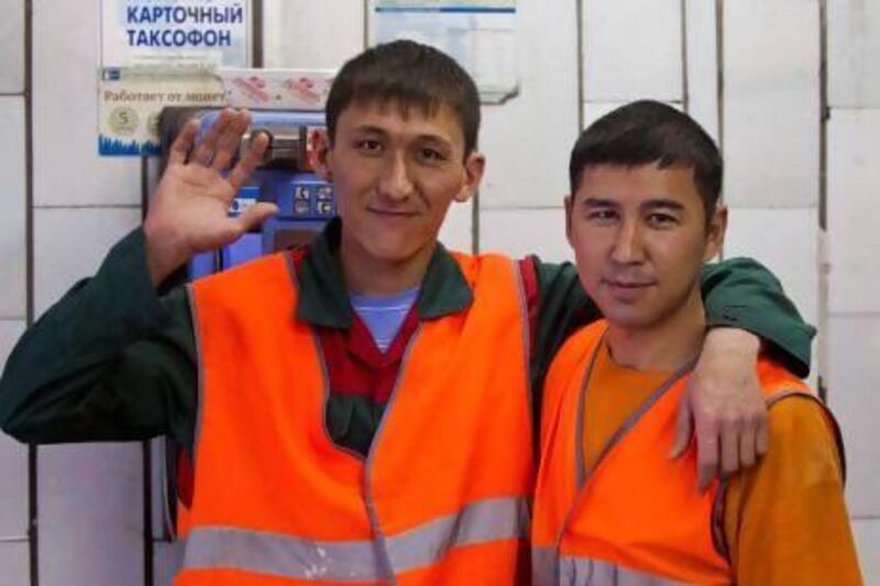 Uzbekistan natives and subway janitors Kushan, right, and Umid at work in Moscow. Two million Muslims now live in Moscow, a city of 12 million.