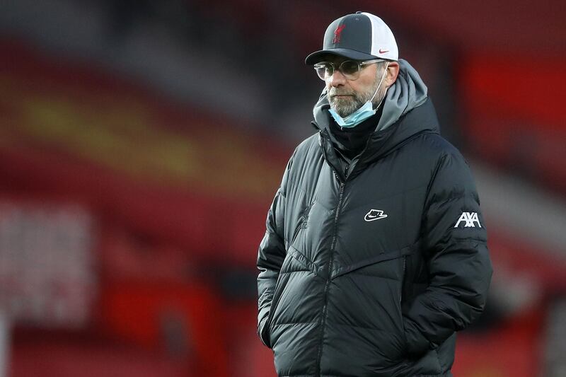 Liverpool's German manager Jurgen Klopp looks on ahead of the English FA Cup fourth round football match between Manchester United and Liverpool at Old Trafford in Manchester, north west England, on January 24, 2021. RESTRICTED TO EDITORIAL USE. No use with unauthorized audio, video, data, fixture lists, club/league logos or 'live' services. Online in-match use limited to 120 images. An additional 40 images may be used in extra time. No video emulation. Social media in-match use limited to 120 images. An additional 40 images may be used in extra time. No use in betting publications, games or single club/league/player publications.
 / AFP / POOL / Martin Rickett / RESTRICTED TO EDITORIAL USE. No use with unauthorized audio, video, data, fixture lists, club/league logos or 'live' services. Online in-match use limited to 120 images. An additional 40 images may be used in extra time. No video emulation. Social media in-match use limited to 120 images. An additional 40 images may be used in extra time. No use in betting publications, games or single club/league/player publications.
