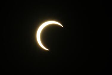 UAE residents are being urged to enjoy the partial solar eclipse safely. EPA
