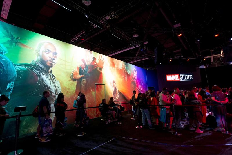 Attendees lineup up for the Marvel experience. EPA.