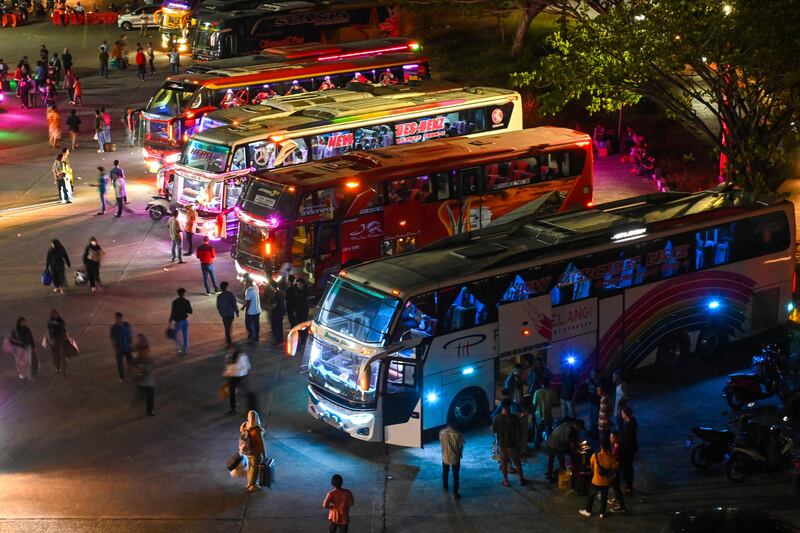 Passengers at a bus station in Banda Aceh start the journey home for the festivities. AFP