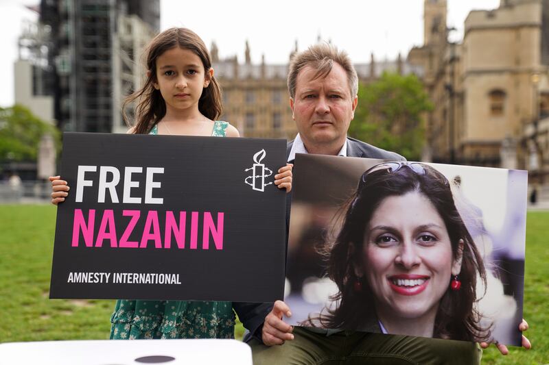 On Thursday, Nazanin Zaghari-Ratcliffe's husband Richard and daughter Gabriella marked Nazanin's 2,000th day in detention. PA