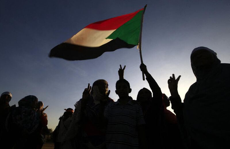 Sudanese women march in Khartoum to mark International Day for Eliminating Violence against Women, in the first such rally held in the northeast African country in decades, on November 25, 2019. - Chanting "Freedom, peace, justice," the catchcry of the protest movement that led to autocrat Omar al-Bashir's ouster in April, the demonstrators took to the streets in the Burri district, a site of regular anti-Bashir protests earlier this year. (Photo by Ashraf SHAZLY / AFP)