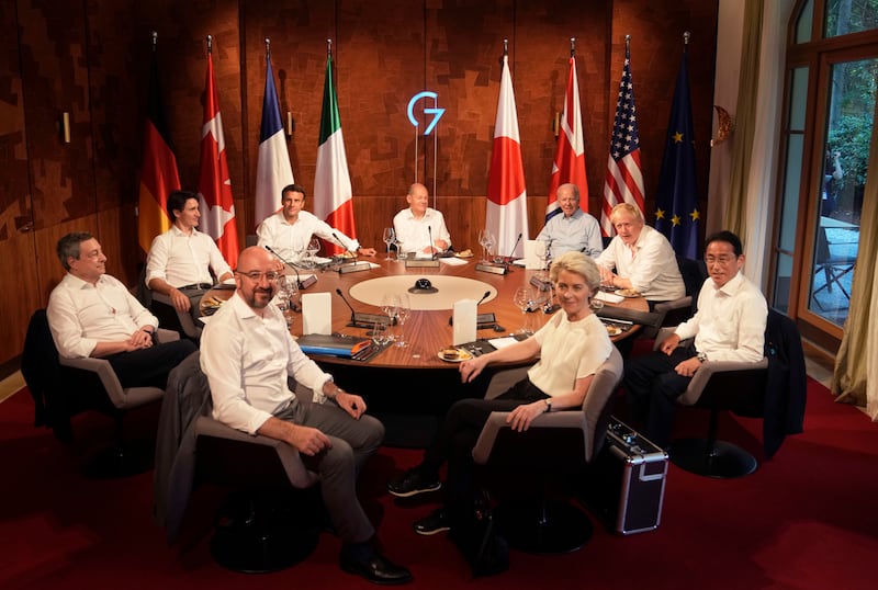 G7 leaders have dinner at Elmau Castle in Kruen, Germany. Clockwise from front left, European Council President Charles Michel, Italy's Prime Minister Mario Draghi, Canada's Prime Minister Justin Trudeau, French President Emmanuel Macron, German Chancellor Olaf Scholz, US President Joe Biden, British Prime Minister Boris Johnson, Japan's Prime Minister Fumio Kishida and European Commission President Ursula von der Leyen.  AP