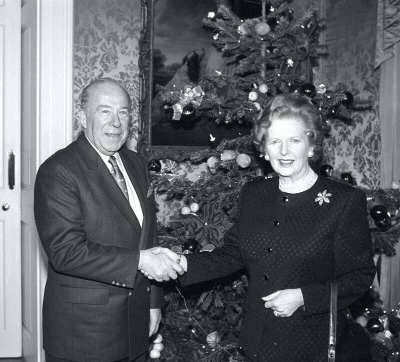 Prime Minister Margaret Thatcher shakes hands with US Secretary of State George Shultz at No 10 Downing Street, where he briefed the PM on the Washington arms summit.