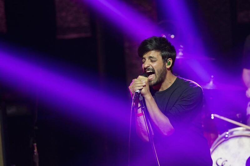 Lead vocalist Sameer Gadhia of Young the Giant performs at the iHeartRadio theatre in Burbank, California 14 May, 2014. Reuters 