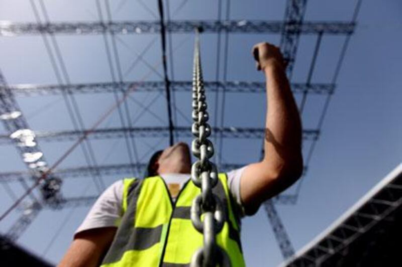 Going up: work takes place at the the venue for the Ultimate Fighting Championship at Ferrari World on Yas Island.