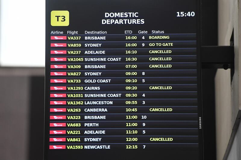 Cancelled flights on a departures board at Melbourne Airport in Victoria, Australia.  EPA