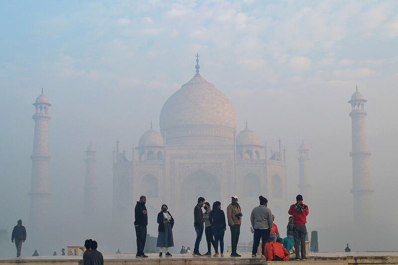 The Taj Mahal in Agra is shrouded in fog. AFP