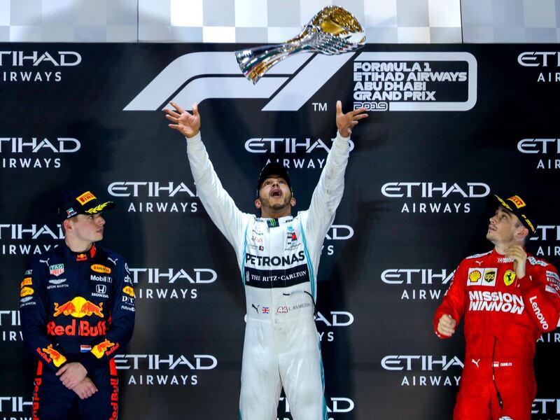 Abu Dhabi, United Arab Emirates, December 1, 2019.  
Formula 1 Etihad Airways Abu Dhabi Grand Prix.
--  Awards Ceremony.
(L-R)  Max Verstappen- 2nd place (Red Bull), Lewis Hamilton- 1st (Mercedes) and   Charles Leclerc - 3rd. (Ferrari).
Victor Besa / The National
Section:  SP
Reporter:  Simon Wilgress-Pipe