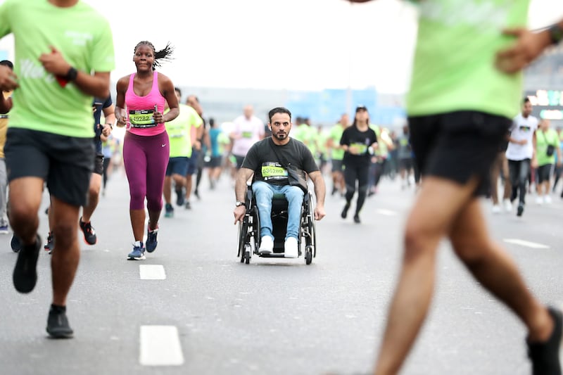 Runners, joggers, wheelchair-users and walkers participate in the event
