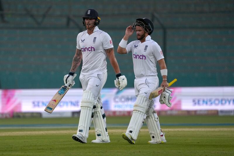 England's Ben Stokes and Ben Duckett walk off the field at the end of the third day. AP 