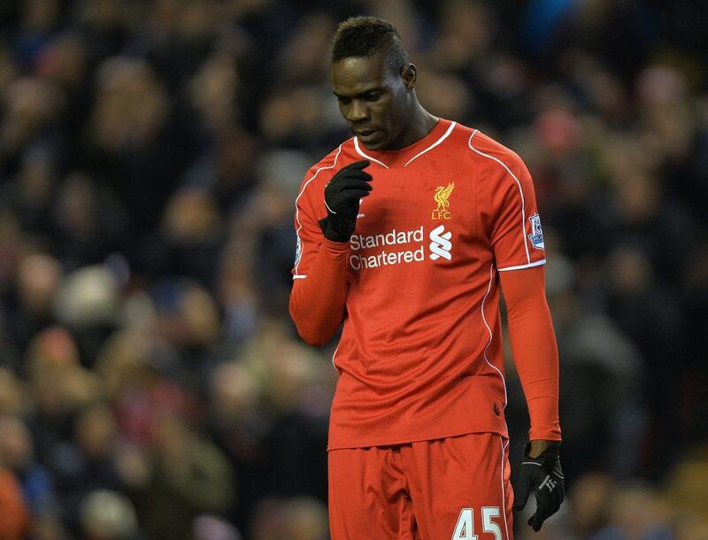 Liverpool's Mario Balotelli reacts during his side's Premier League match on Monday agains Swansea City. Peter Powell / EPA