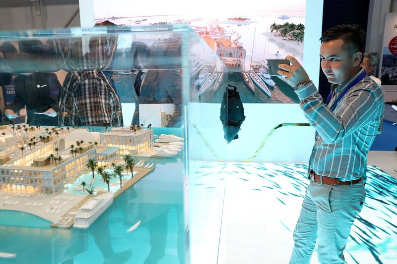 Dubai, United Arab Emirates - September 11th, 2017: Visitors at the Floating Venice project by Kleindienst at the 16th addition of Cityscape Global. Monday, September 11th, 2017 at World Trade centre, Dubai. 