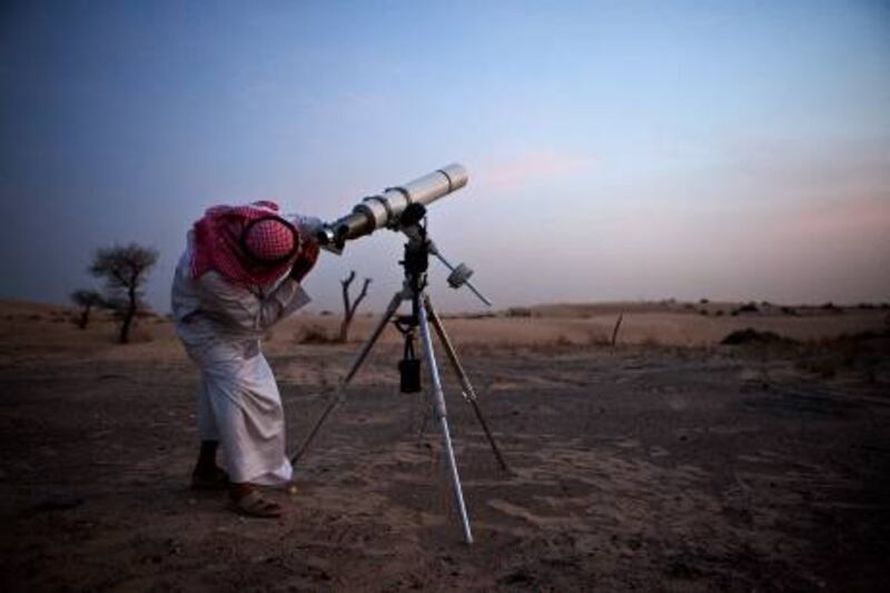 United Arab Emirates - Dubai - August 10th, 2010:  Hasan Hariri, a member of the official moon spotting team, uses his telescope to look for the moon to signal the start of Ramadan.  (Galen Clarke/The National) for observers 