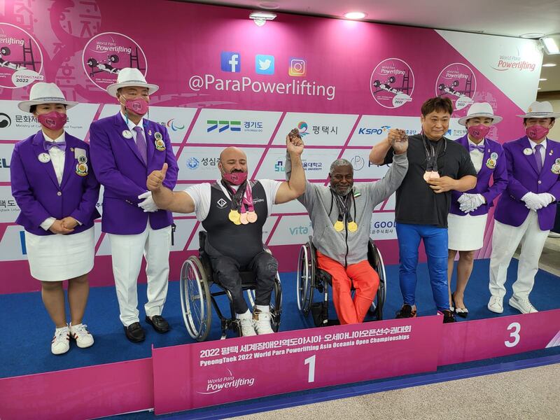 Mohammed Khamis Khalaf, centre, celebrates his gold medal at the Asia-Oceania Para Powerlifting Open Championships in South Korea. Photo: UAE Paralympic Committee