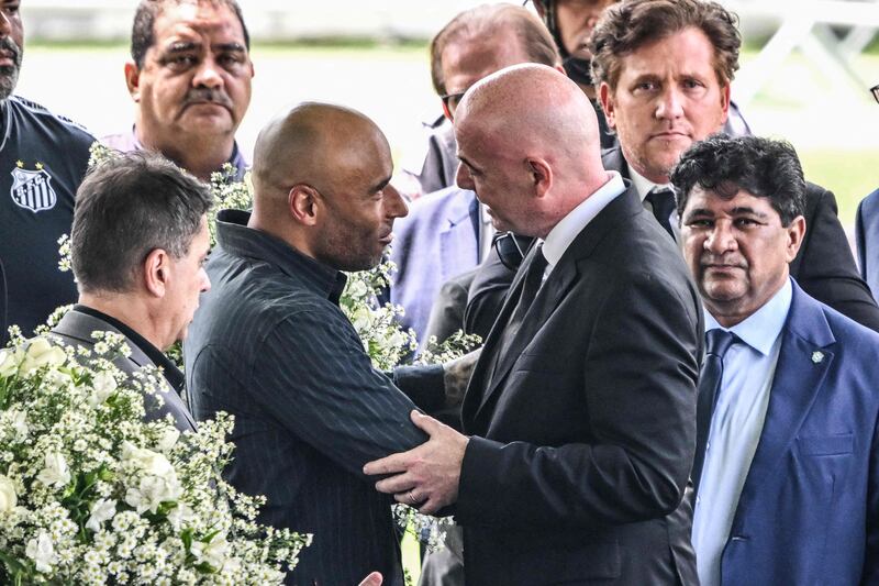 Fifa president Gianni Infantino with Pele's son Edinho. AFP