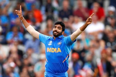 Cricket - ICC Cricket World Cup Semi Final - India v New Zealand - Old Trafford, Manchester, Britain - July 9, 2019   India's Jasprit Bumrah celebrates taking the wicket of New Zealand's Martin Guptill   Action Images via Reuters/Jason Cairnduff