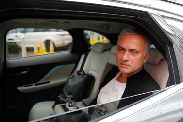 Jose Mourinho is driven away after leaving his job as Manchester United manager in December, 2018. He's now in charge of Tottenham. Reuters