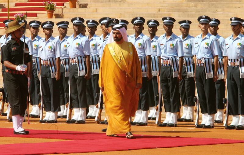 Sheikh Mohammed bin Rashid inspects a guard of honour during a welcome ceremony at the presidential palace in New Delhi. AFP Photo / Raveendran
