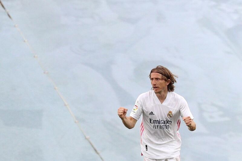Luka Modric celebrates scoring Real Madrid's injury-time winner. EPA