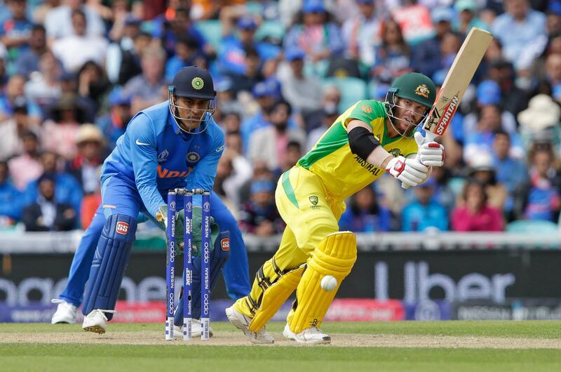 LONDON, ENGLAND - JUNE 09: David Warner of Australia plays a shot during the Group Stage match of the ICC Cricket World Cup 2019 between India and Australia at The Oval on June 9, 2019 in London, England. (Photo by Henry Browne/Getty Images)