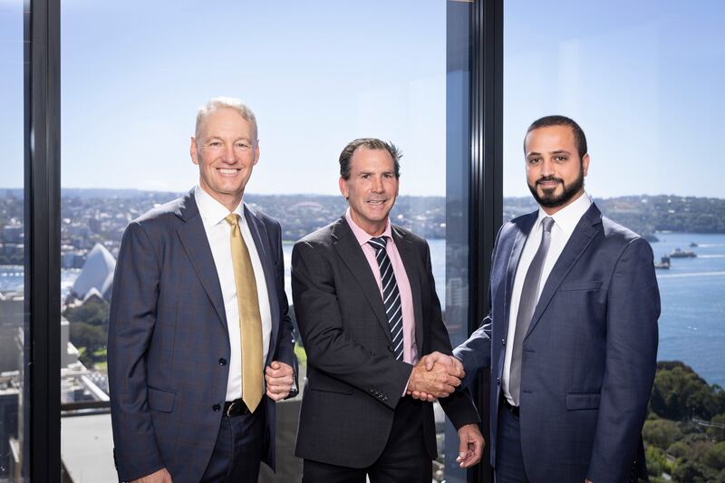 Ahmed Al Shamsi, director of energy and utilities at ADQ, right, Paul Oppenheim, founder and director of Plenary Group, left, and David Lamming, chief executive of Plenary Group. Photo: ADQ