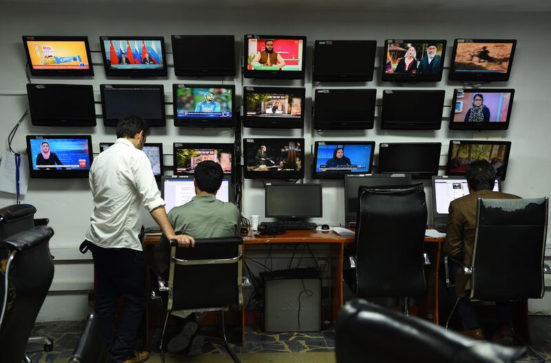 (FILES) In this file photo taken on September 11, 2018 Afghan reporters of Tolo News work in the newsroom at Tolo TV station in Kabul. Journalists faced growing dangers of being targeted for killing for their work in 2018 even as the risks from war and conflict declined, a media watchdog said December 19, 2018. The Committee to Protect Journalists said 34 of the 53 journalists killed on duty this year around the world were "singled out for murder." "The number of journalists targeted for murder in reprisal for their reporting nearly doubled in 2018 from a year earlier, driving up the overall count of journalists killed on the job," the New York-based watchdog group said in a report. The CPJ report said that while the total number of journalists killed on duty hit its highest level in three years, the number killed in conflict fell to its lowest since 2011. The total is up from 47 killed in 2017, of which 18 were "pinpointed for murder," CPJ said."Afghanistan, where extremists have stepped up deliberate attacks on journalists, was the deadliest country and accounted for much of the increase," the report said.

 - 
 / AFP / WAKIL KOHSAR
