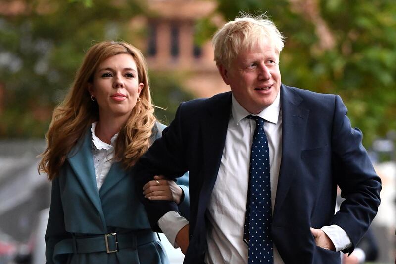 MANCHESTER, ENGLAND - SEPTEMBER 28: British Prime Minister Boris Johnson and his girlfriend Carrie Symonds arrive at the Conservative Party Conference on September 28, 2019 in Manchester, England. Despite Parliament voting against a government motion to award a recess, Conservative Party Conference still goes ahead. Parliament will continue with its business for the duration. (Photo by Jeff J Mitchell/Getty Images)