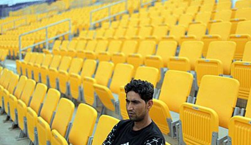 Mohammed Abid cuts a lonely figure as he watches a match between the UAE and  the USA in the World Twenty20 qualifier at Zayed Cricket Stadium, Abu Dhabi, this month.