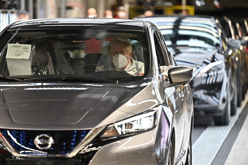 Britain's Prime Minister Boris Johnson tours Japanese auto giant Nissan's production plant in Sunderland, north-east England. UK car production is still 28.7 per cent down on pre-pandemic levels in 2019. AFP