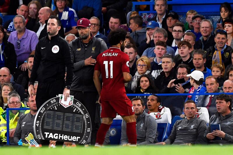 epa07057441 Liverpool's Mohamed Salah (C) leaves the pitch during the English Premier League soccer match between Chelsea FC and Liverpool FC in London, Britain, 29 September 2018.  EPA/WILL OLIVER EDITORIAL USE ONLY. No use with unauthorized audio, video, data, fixture lists, club/league logos or 'live' services. Online in-match use limited to 120 images, no video emulation. No use in betting, games or single club/league/player publications.