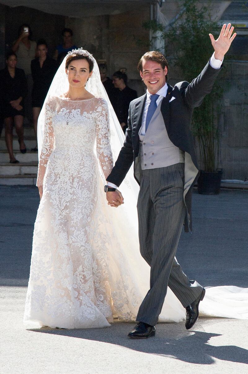 SAINT-MAXIMIN-LA-SAINTE-BAUME, FRANCE - SEPTEMBER 21:  Princess Claire Of Luxembourg and Prince Felix Of Luxembourg depart from their wedding ceremony at the Basilique Sainte Marie-Madeleine on September 21, 2013 in Saint-Maximin-La-Sainte-Baume, France.  (Photo by Pascal Le Segretain/Getty Images)