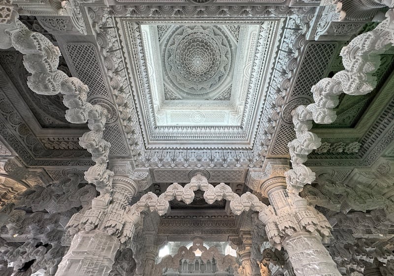 More than 200 intricate hand-carved marble pillars form the interior of the temple. Pawan Singh / The National