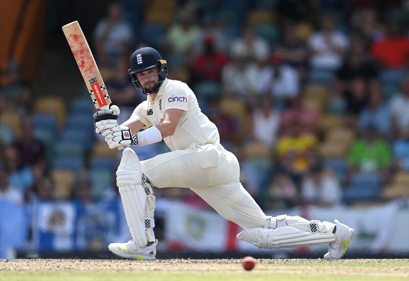 England's Chris Woakes hits out during Day 2. Getty
