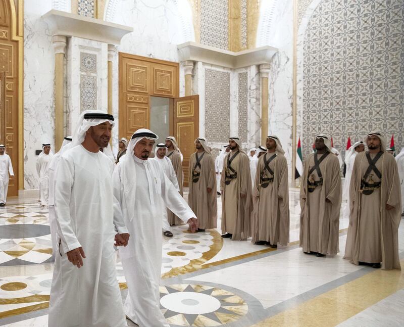 ABU DHABI, UNITED ARAB EMIRATES - May 08, 2019: HH Sheikh Mohamed bin Zayed Al Nahyan, Crown Prince of Abu Dhabi and Deputy Supreme Commander of the UAE Armed Forces (L) and HH Sheikh Humaid bin Rashid Al Nuaimi, UAE Supreme Council Member and Ruler of Ajman (R), depart from an iftar reception at the Presidential Palace. 

( Hamad Al Mansoori / for the Ministry of Presidential Affairs )
---