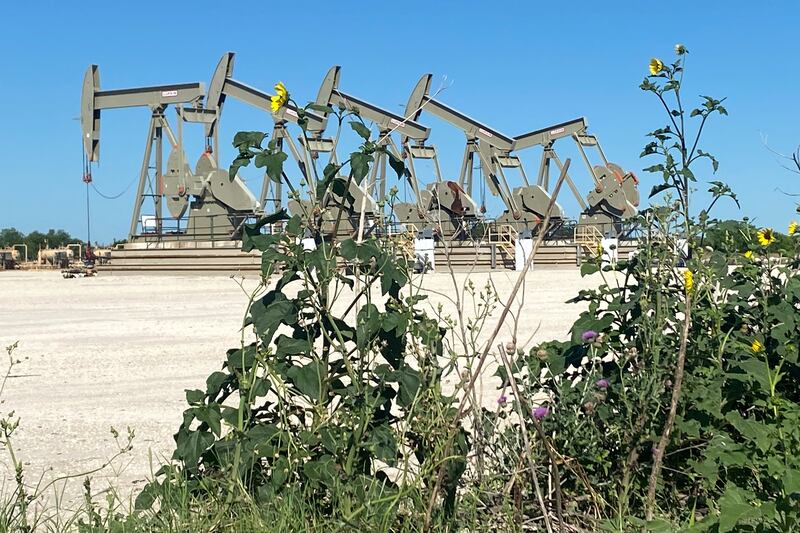 Oil pump jacks in Texas. The industry is raising its annual spending plans to meet output targets. Reuters