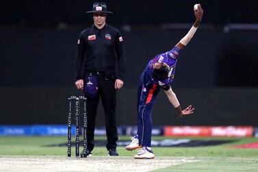 Abu Dhabi, United Arab Emirates - November 17, 2019: Sequence pictures of Bangla Tigers' Kevin Koththiigoda bowling during the game between Karnataka Tuskers and Bangla Tigers in the Abu Dhabi T10 league. Sunday the 17th of November 2019. Zayed Cricket Stadium, Abu Dhabi. Chris Whiteoak / The National