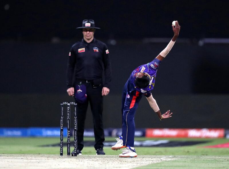 Abu Dhabi, United Arab Emirates - November 17, 2019: Sequence pictures of Bangla Tigers' Kevin Koththiigoda bowling during the game between Karnataka Tuskers and Bangla Tigers in the Abu Dhabi T10 league. Sunday the 17th of November 2019. Zayed Cricket Stadium, Abu Dhabi. Chris Whiteoak / The National