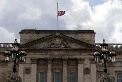 The Union flag flies at half staff at Buckingham Palace in London, after the announcement of the death of Britain's Prince Philip, Friday, April 9, 2021. Buckingham Palace officials say Prince Philip, the husband of Queen Elizabeth II, has died. He was 99. Philip spent a month in hospital earlier this year before being released on March 16 to return to Windsor Castle. (AP Photo/Matt Dunham)