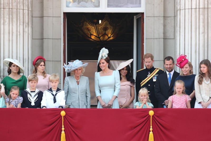 Princess Eugenie, Princess Beatrice, Camilla, Duchess Of Cornwall, Catherine, Duchess of Cambridge, Meghan, Duchess of Sussex,  Prince Harry, Duke of Sussex, Peter Phillips, Autumn Phillips, Isla Phillips and Savannah Phillips on the balcony of Buckingham Palace during Trooping The Colour on June 9, 2018 in London, England. The annual ceremony involving over 1400 guardsmen and cavalry, is believed to have first been performed during the reign of King Charles II. The parade marks the official birthday of the Sovereign, even though the Queen's actual birthday is on April 21st.  Photo by Chris Jackson / Getty Images