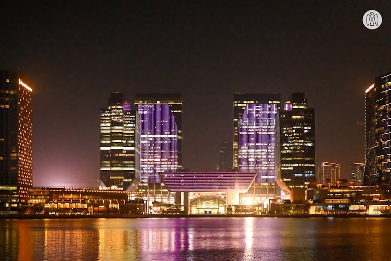 The colour purple was projected on to the facade of buildings at the Abu Dhabi Global Market.