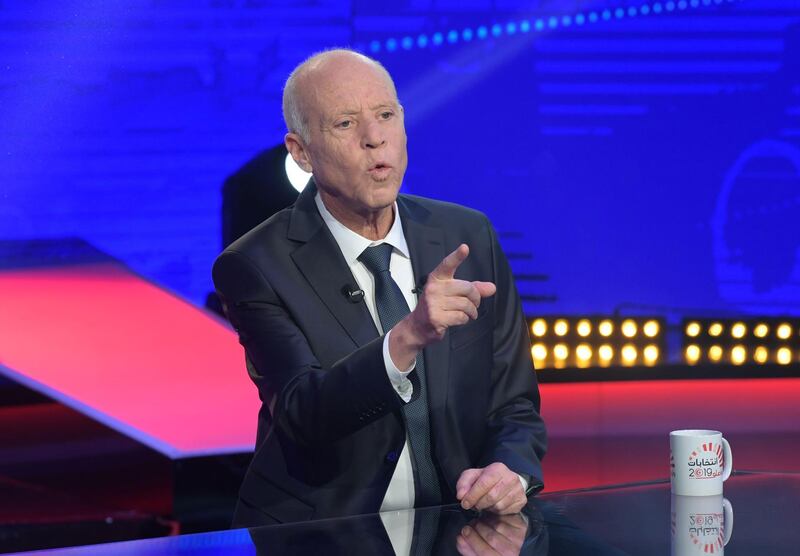 Tunisia's presidential candidates Kais Saied, 61, an independent conservative academic, gestures during a debate against and business tycoon Nabil Karoui, before the second round of the presidential elections in Tunis. AFP