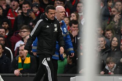 Fulham head coach Marco Silva is escorted from the touchline after being sent off by referee Chris Kavanagh. AFP