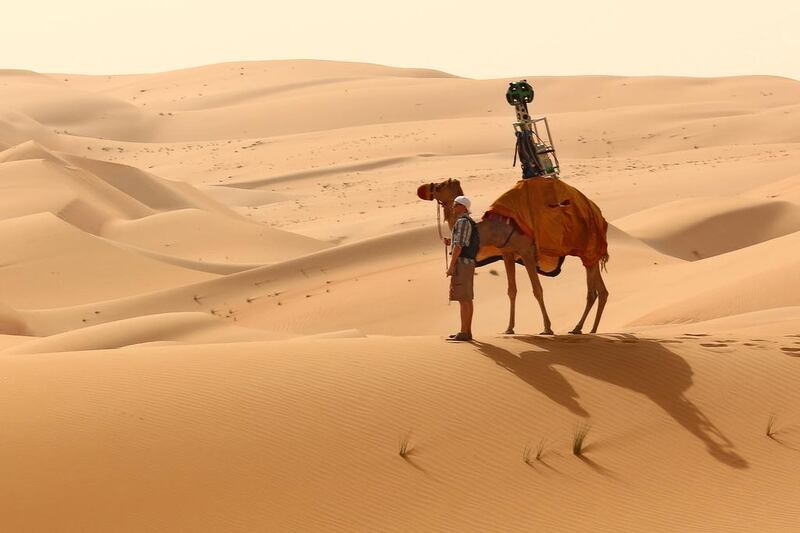 A Google Street View camera is mounted on the back of a camel as the internet giant documents the Liwa Desert.  Courtesy Google 


