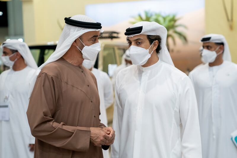 Sheikh Mohamed bin Zayed, Crown Prince of Abu Dhabi and Deputy Supreme Commander of the UAE Armed Forces, left, speaks with Sheikh Mansour bin Zayed, UAE Deputy Prime Minister and Minister of Presidential Affairs.