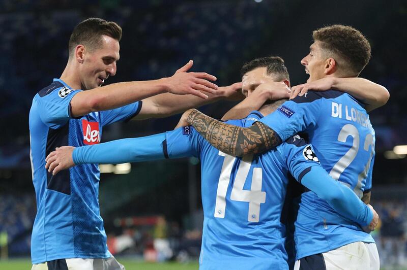 Napoli's Dries Mertens (C) celebrates with teammates after scoring against Genk. EPA